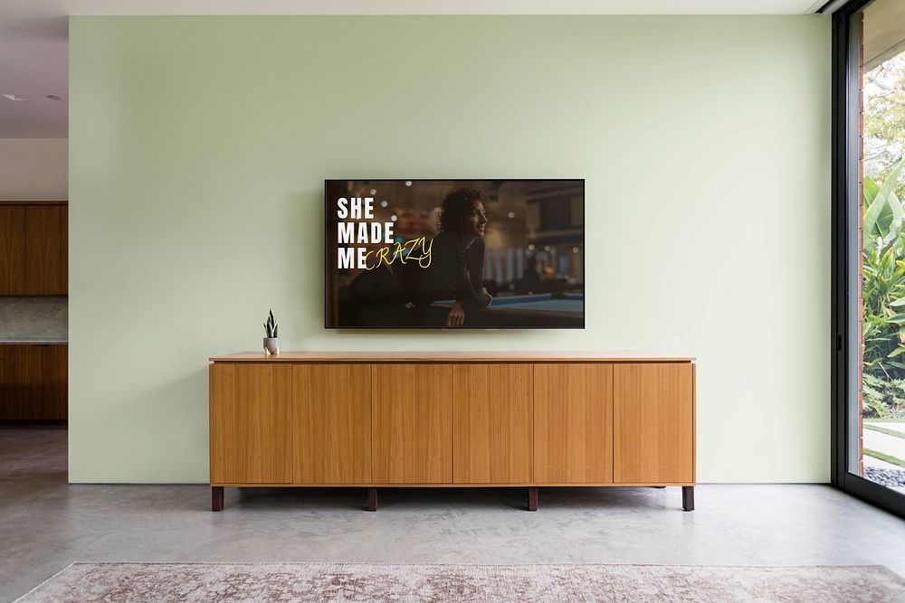 Wall mounted TV mockup, editable screen