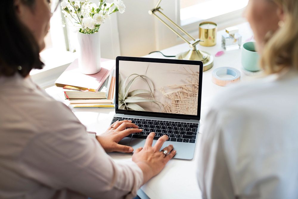 Women working on laptop mockup, editable screen