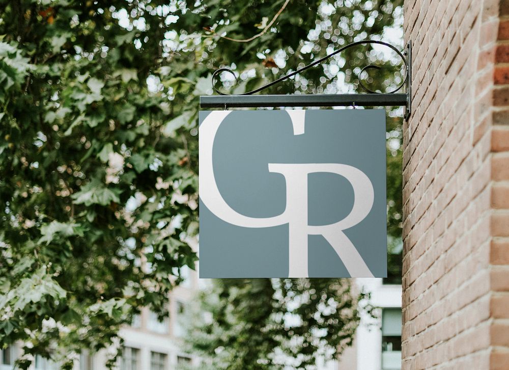 Square sign mockup on brick wall