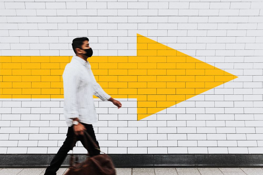 Brick wall mockup, man walking on a street