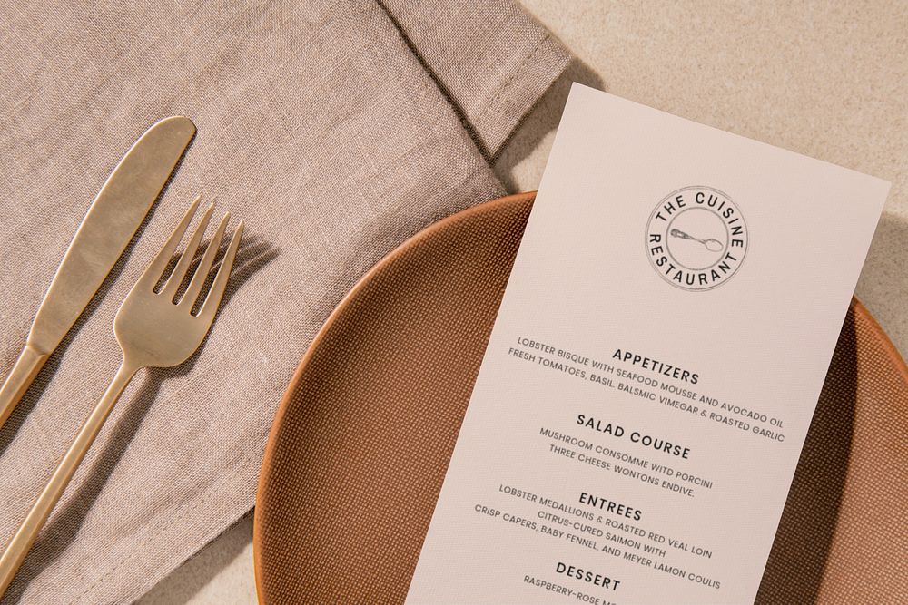 Editable menu card mockup on a dining table 