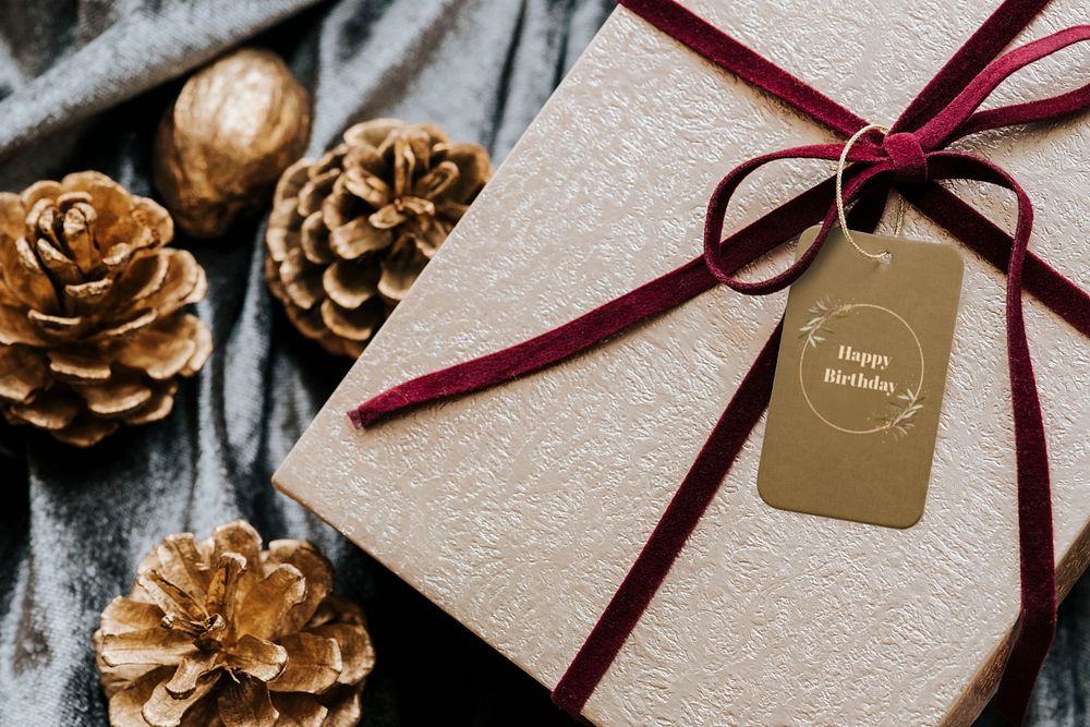 Tag label mockup on a Christmas gift box, editable design 