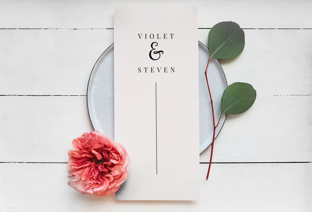 Editable wedding menu card mockup on a dining table 