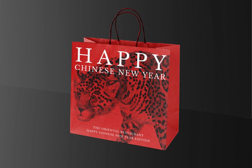 Red shopping bag mockup, editable Chinese New Year celebration