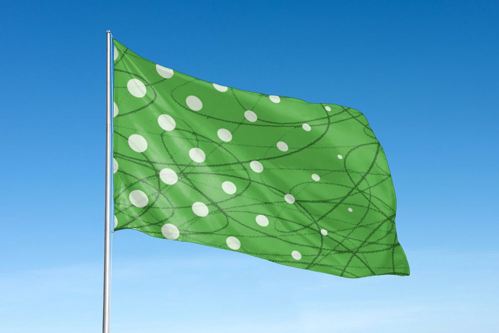 Waving flag mockup, green polka dot design