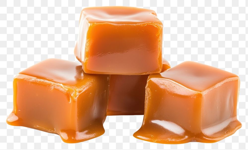 Three caramel cubes stacked and melted caramel chocolate dessert ketchup.