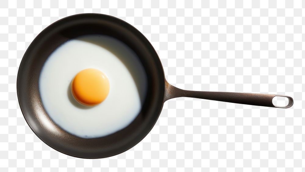 PNG Fried egg on pan simplicity tableware freshness. AI generated Image by rawpixel.