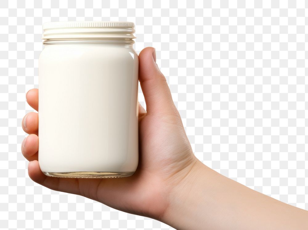 PNG  Jar mockup holding hand milk.