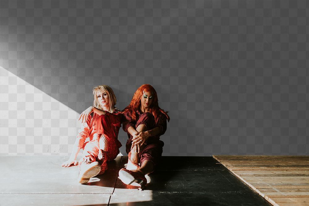 Wall mockup png, drag queens sitting on a black floor