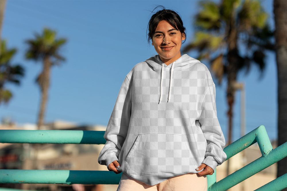 Customizable hoodie png mockup, transparent streetwear apparel on a confident Latina woman