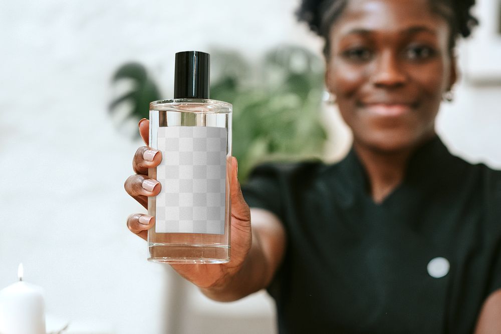 Perfume bottle png mockup in African American woman&rsquo;s hands, transparent design