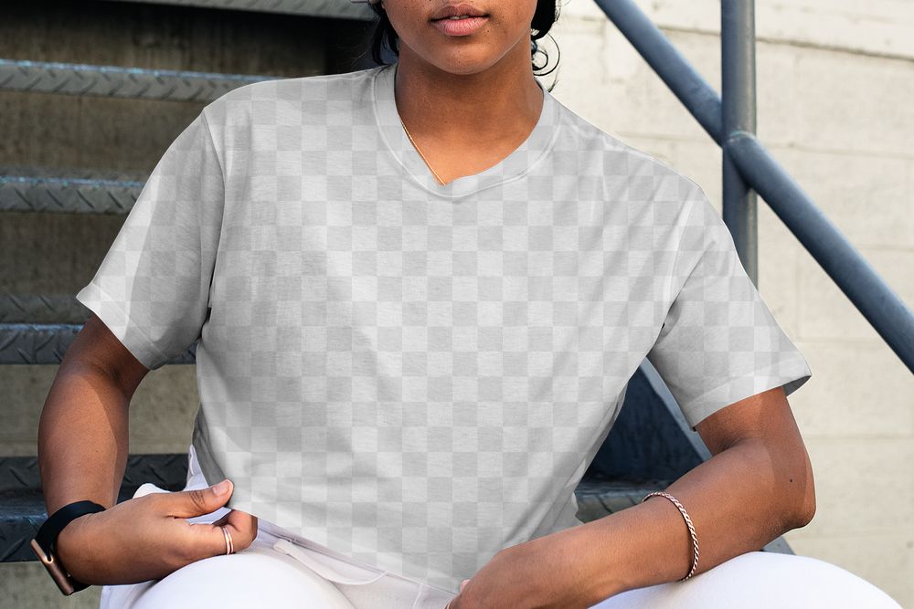 Png crop tee mockup worn by a woman sitting on the stairs