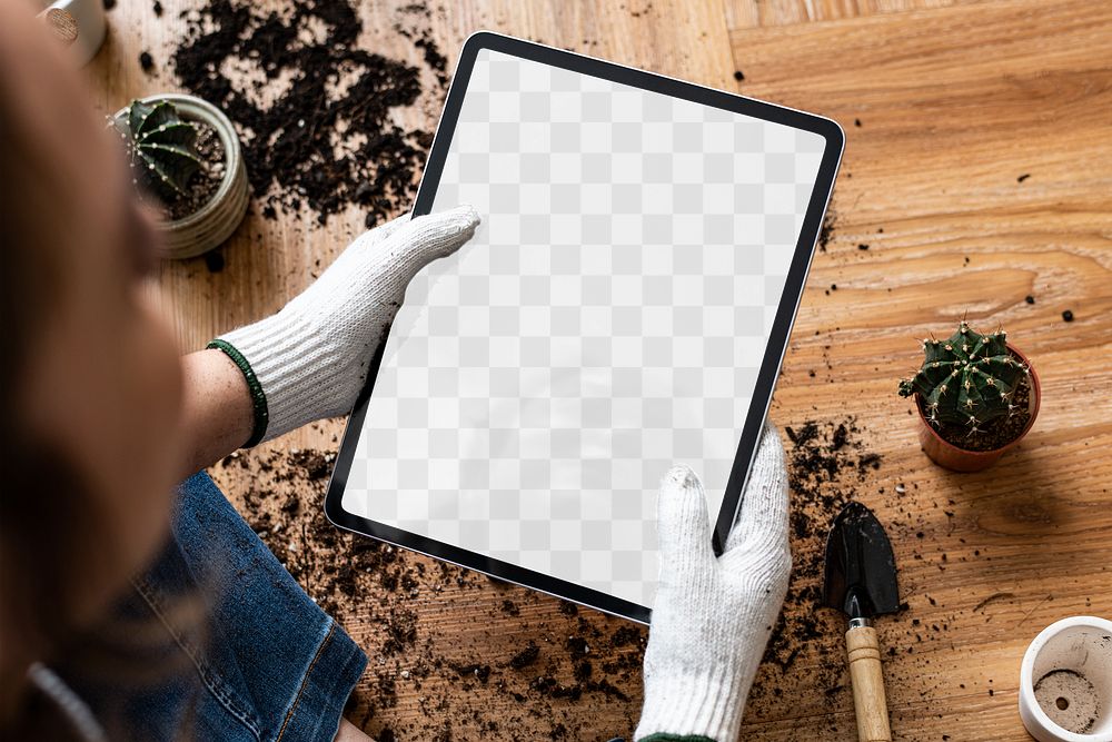 Digital tablet transparent mockup png in a hand of a gardener