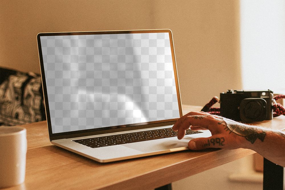 Laptop screen mockup png on a wooden desk