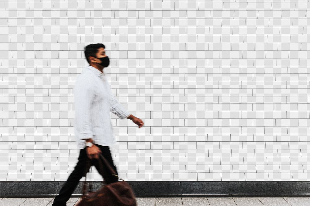 Wall mockup png with a man walking past in the new normal