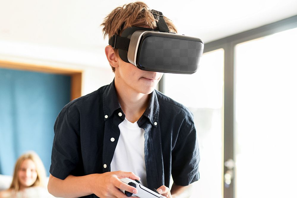 VR headset png mockup, boy playing game, entertainment technology