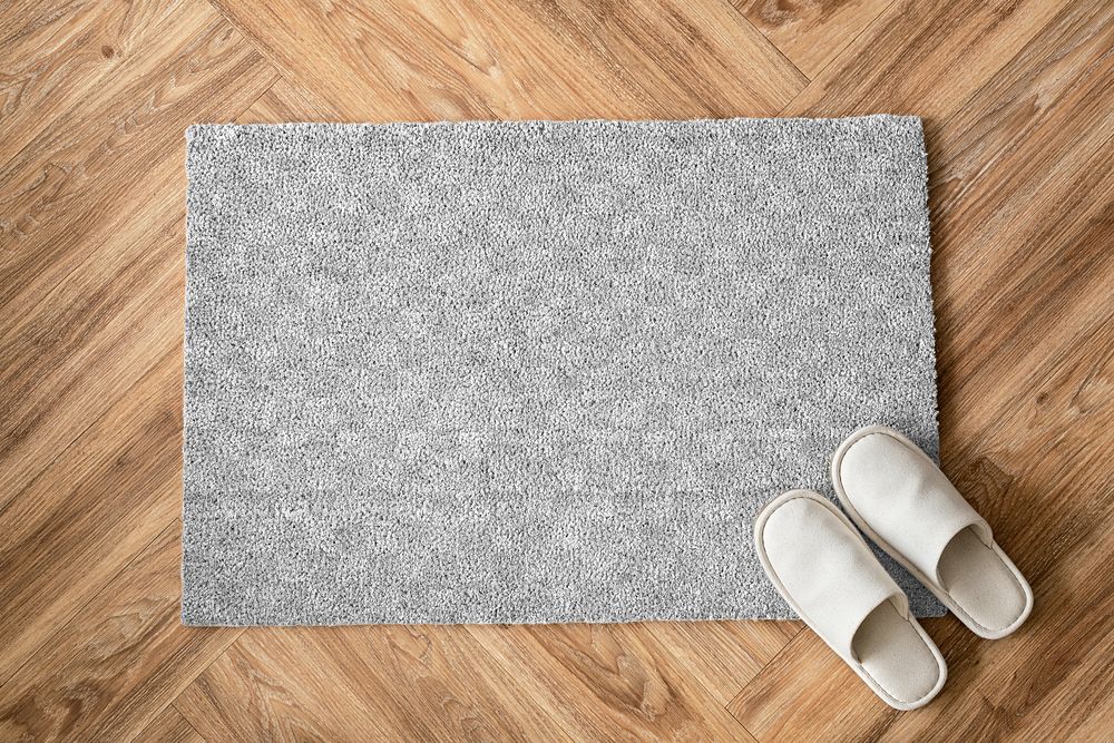Doormat transparent png mockup with white slippers