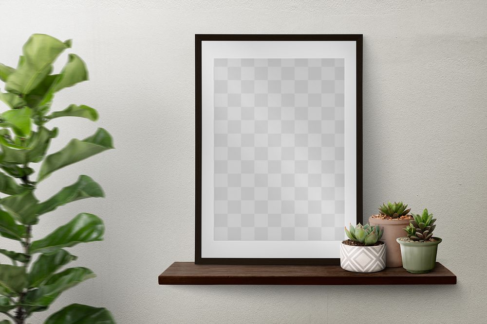 Dark picture frame png mockup on a shelf against a wall