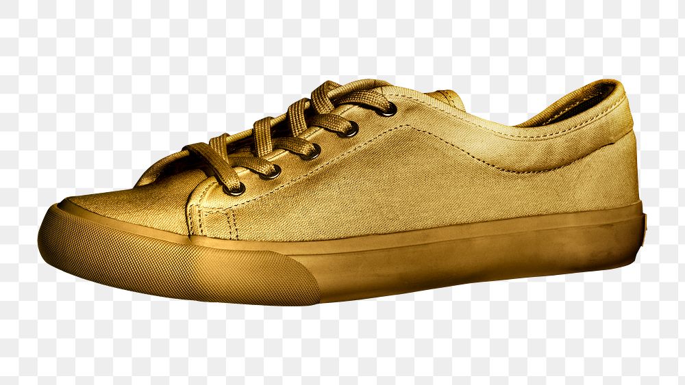Unisex golden sneakers with copy space 