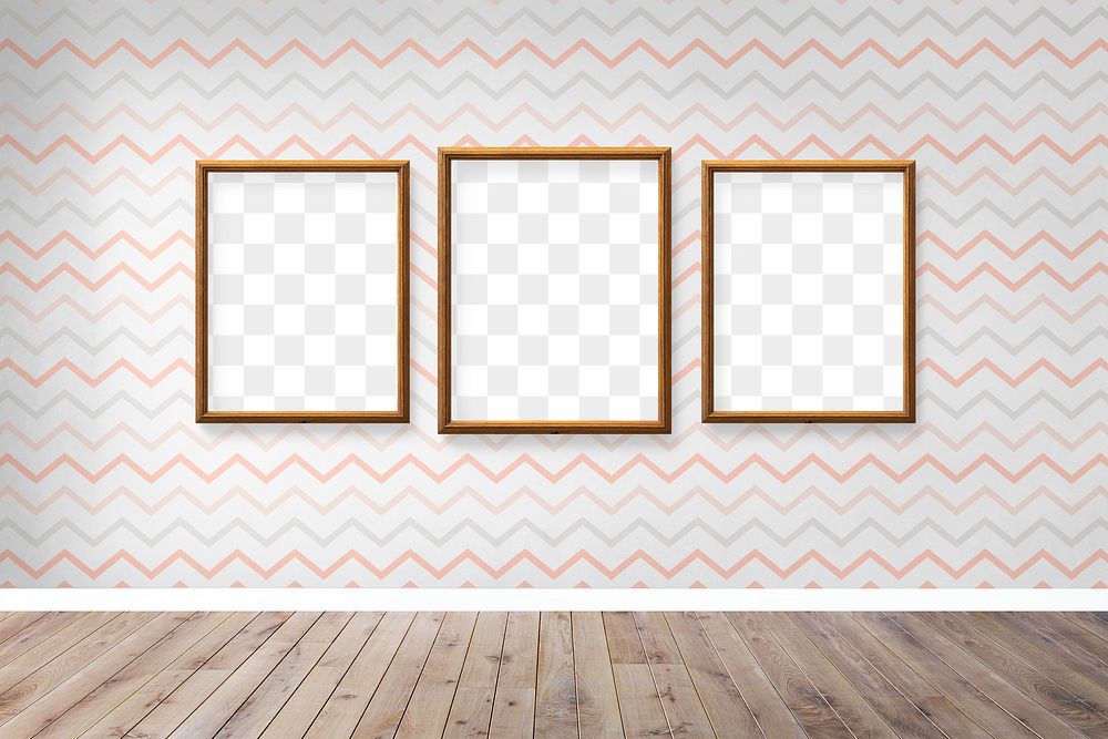 Three blank wooden picture frame mockups hanging on a patterned wall