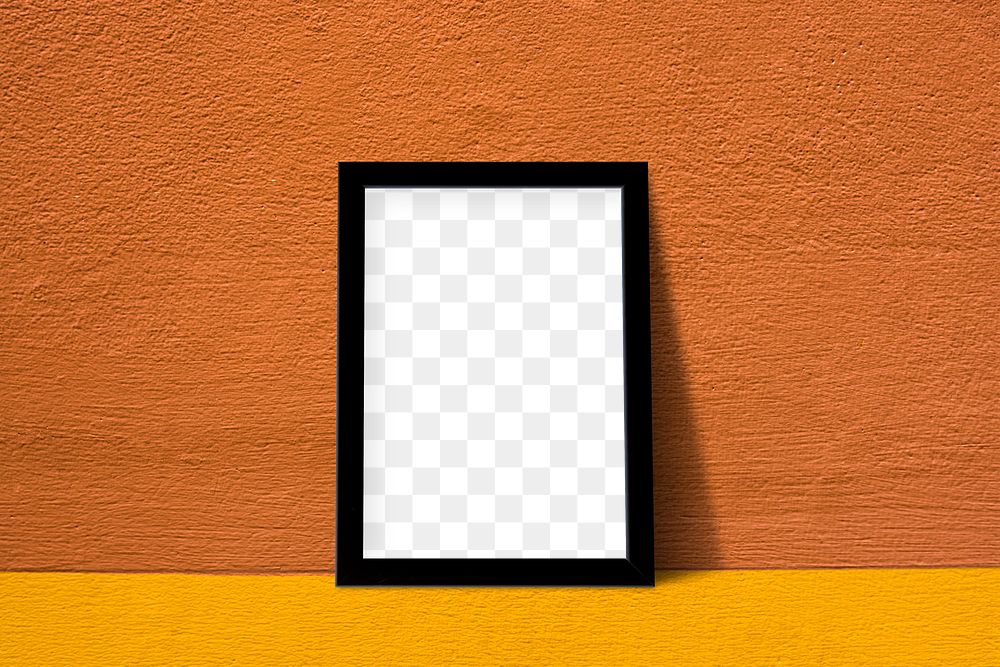 Black picture frame mockup against an orange wall