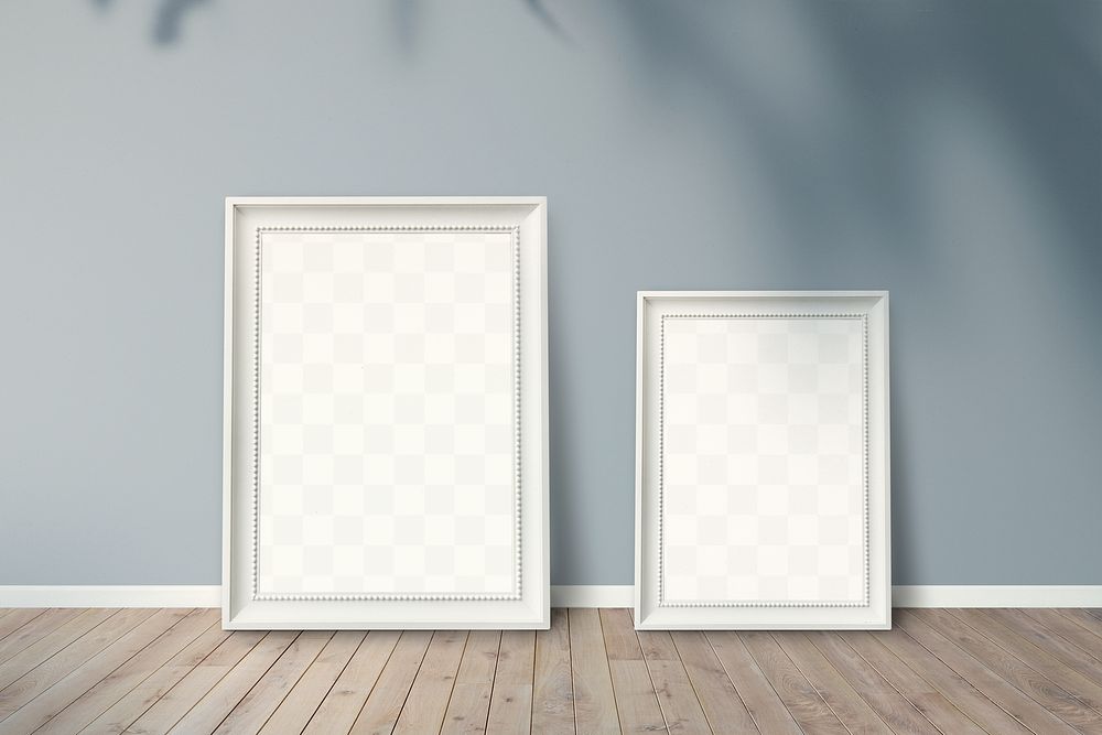 White picture frame mockups leaning against a gray wall