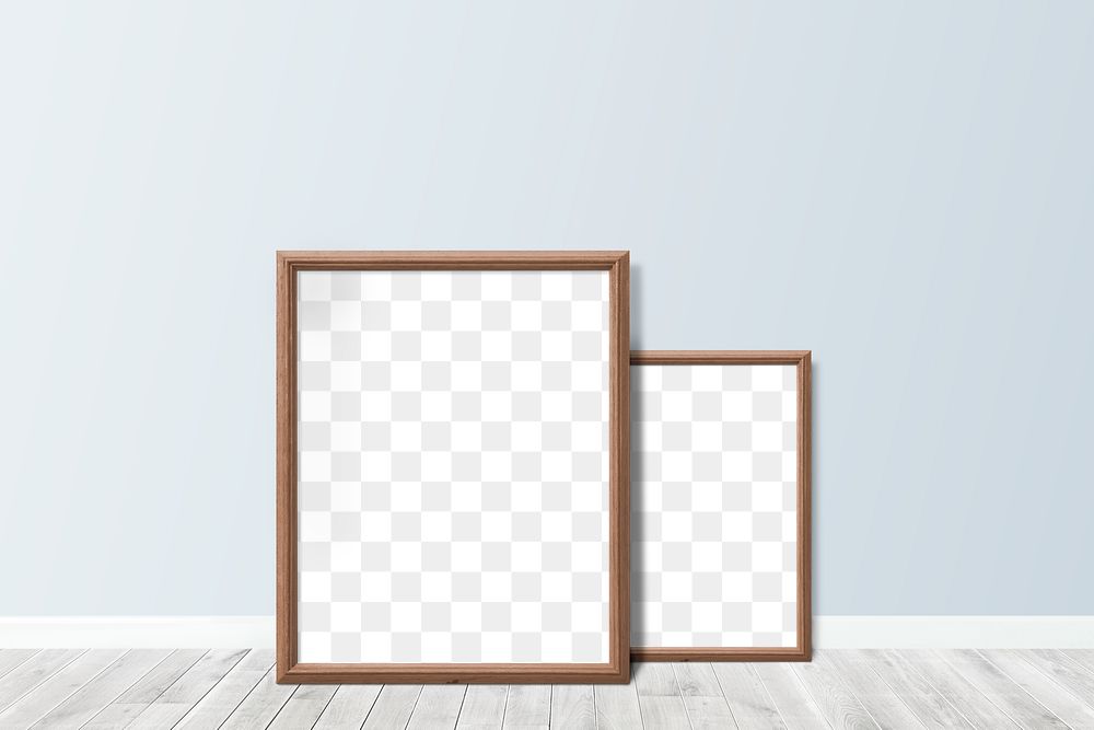 Wooden picture frame mockups leaning against a light blue wall