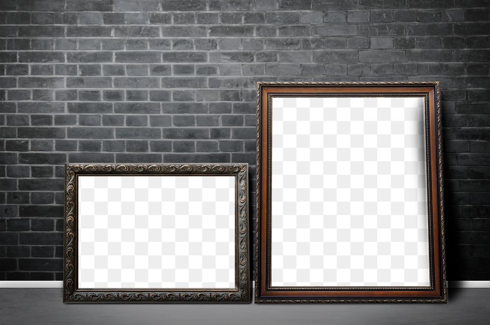 Blank vintage picture frame mockups leaning against a dark brick wall