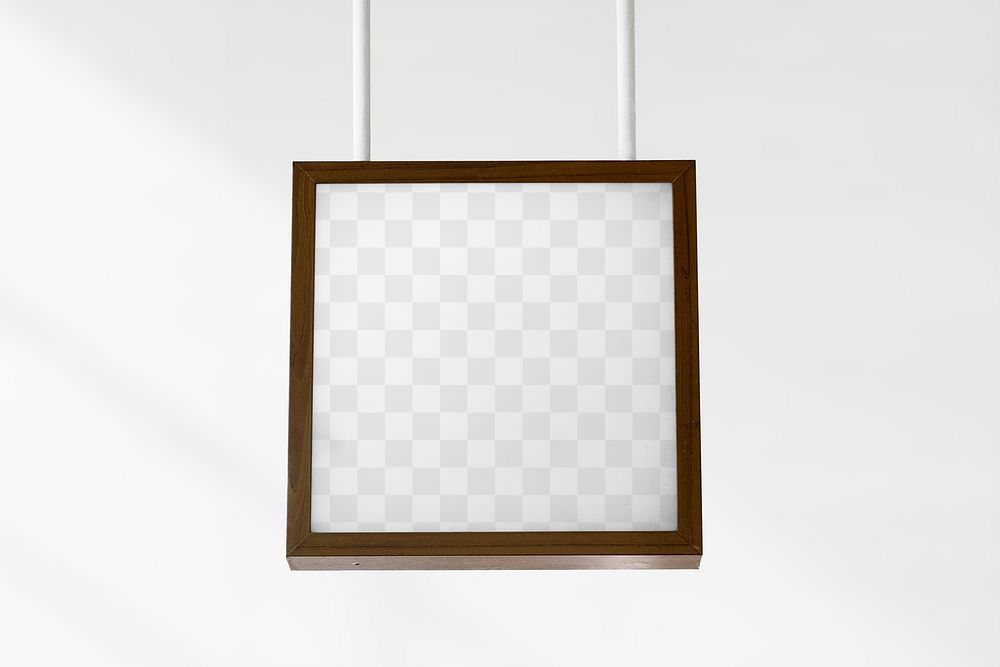 Brown framed sign mockup png hanging from the ceiling