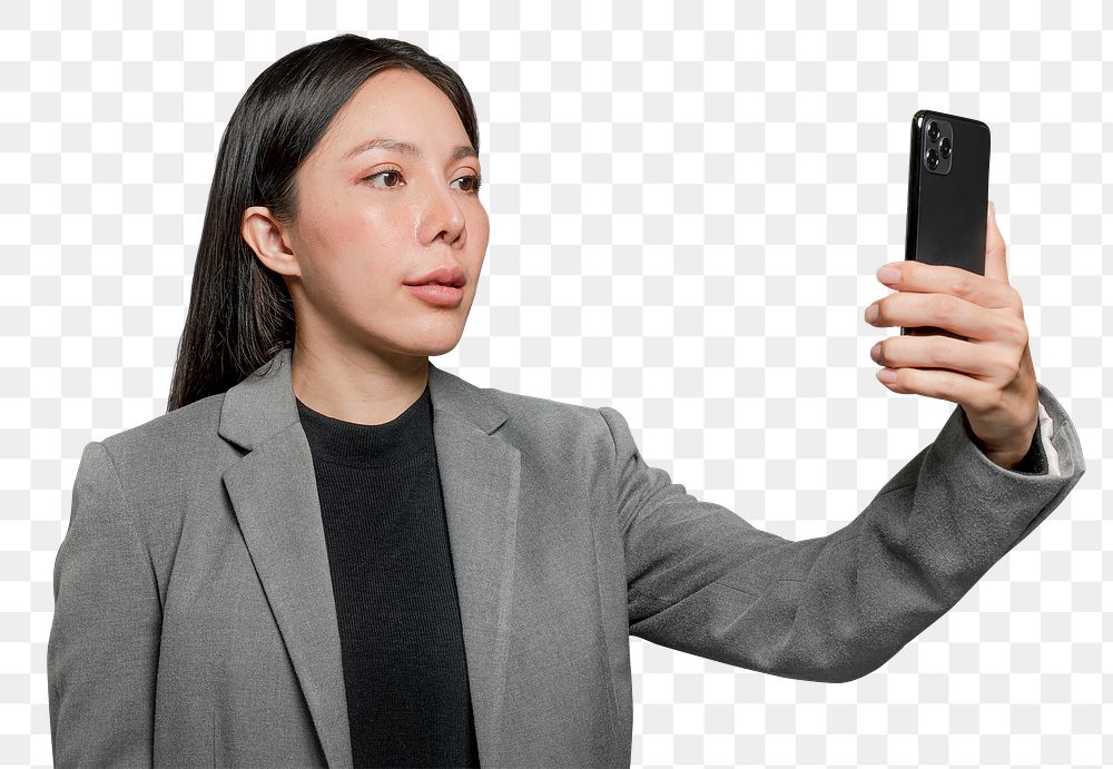 Businesswoman scanning her face to unlock phone security technology