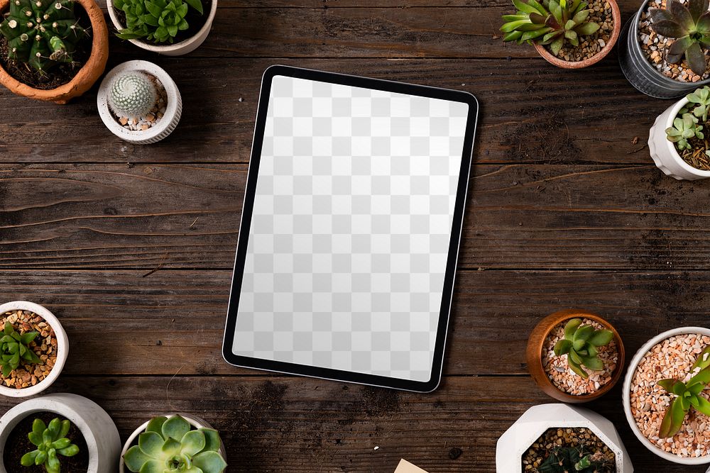 Tablet png screen mockup on plant parent table flat lay