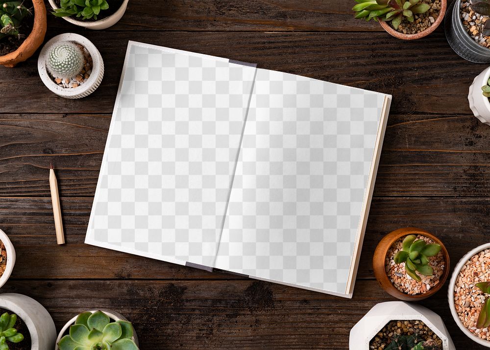 Book png mockup on wooden table with potted plants flat lay