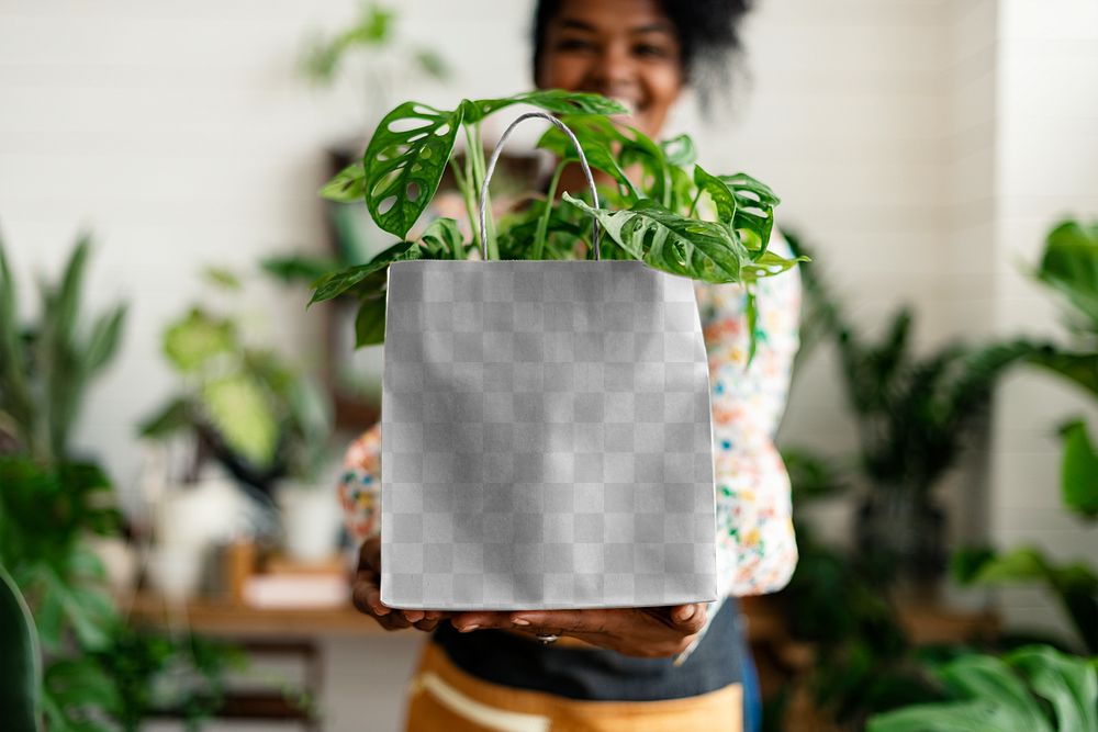shopping bag mockup with plant inside eco-friendly shop