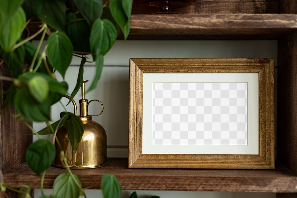 Png picture frame mockup on wooden shelf with houseplants home decor