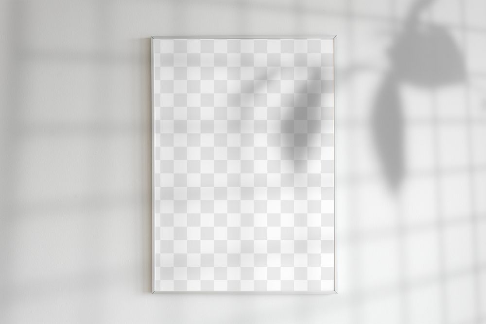 Blank frame on a wall with plant shadow