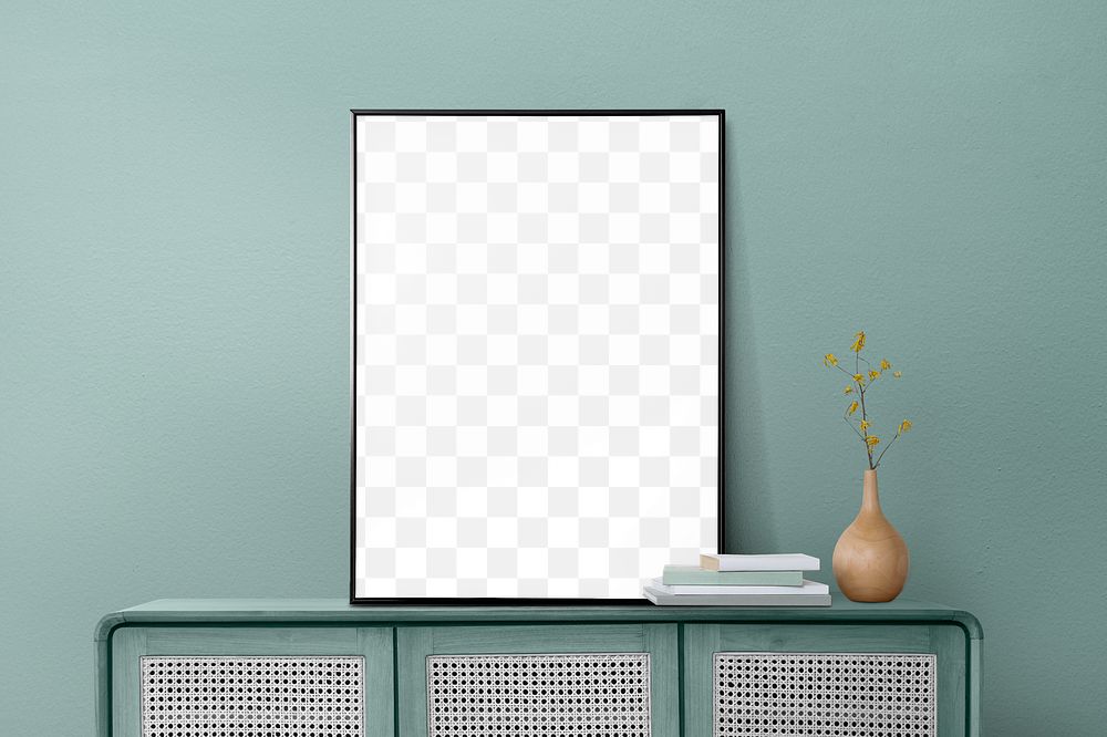 Picture frame png mockup leaning on a mint green wall in a living room