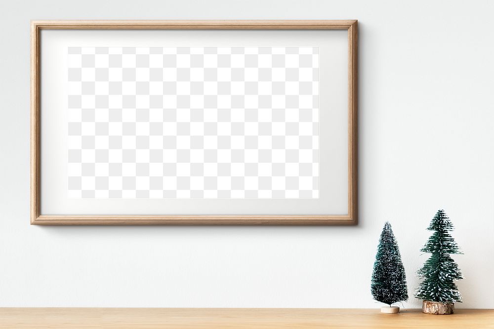 Wooden picture frame mockup by mini Christmas tree decor 