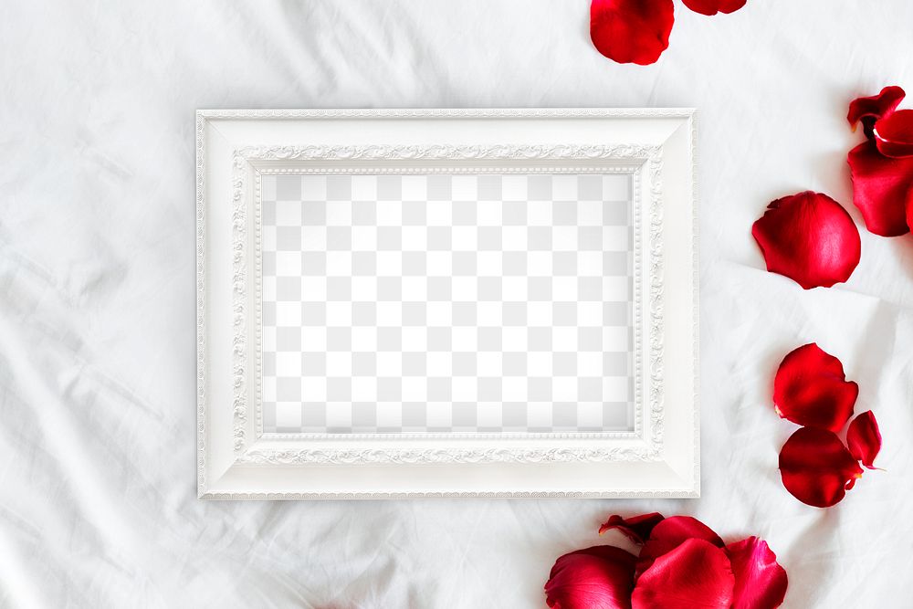 White picture frame mockup on a white bedsheet surrounded by rose petals 