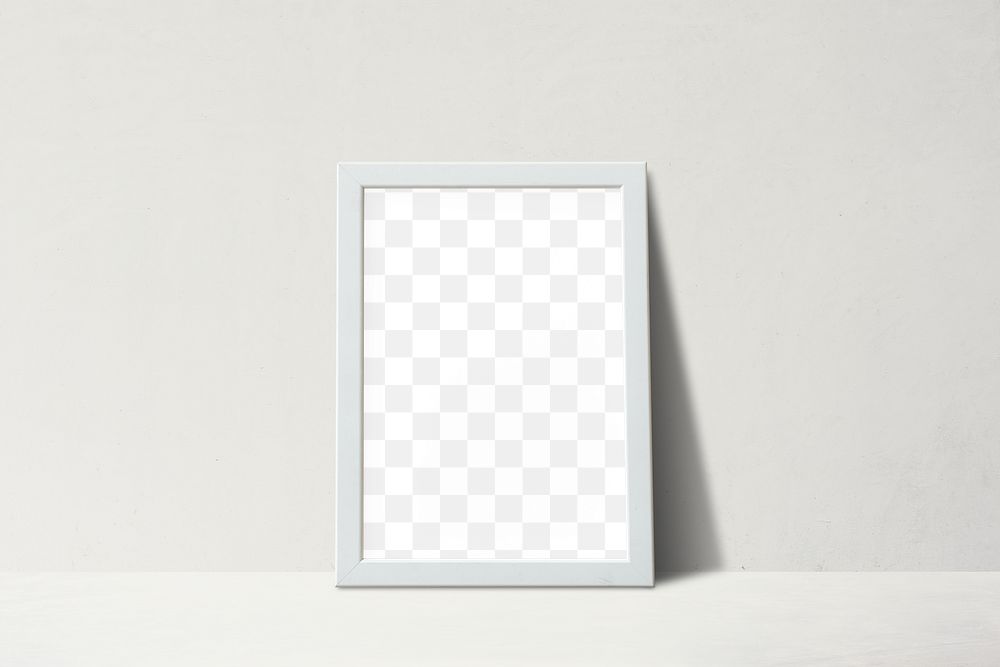White picture frame leaning against on a beige Premium PNG rawpixel