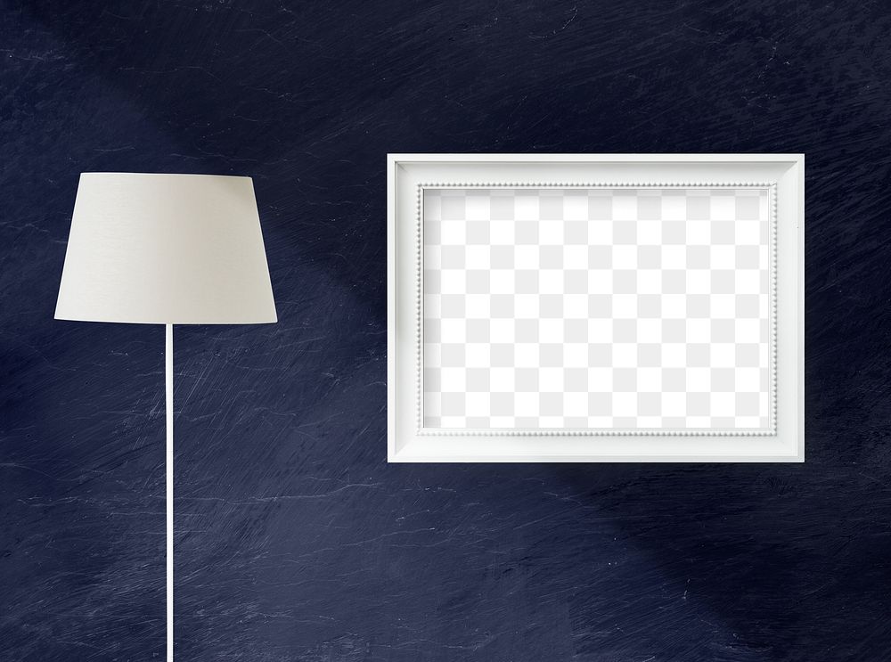 White lamp by a blue wall hanged with a blank white picture frame mockup