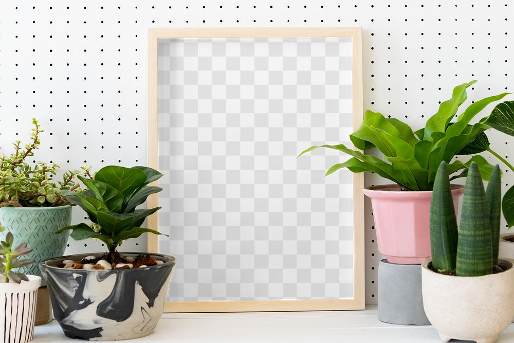 Png picture frame mockup among houseplants home decor