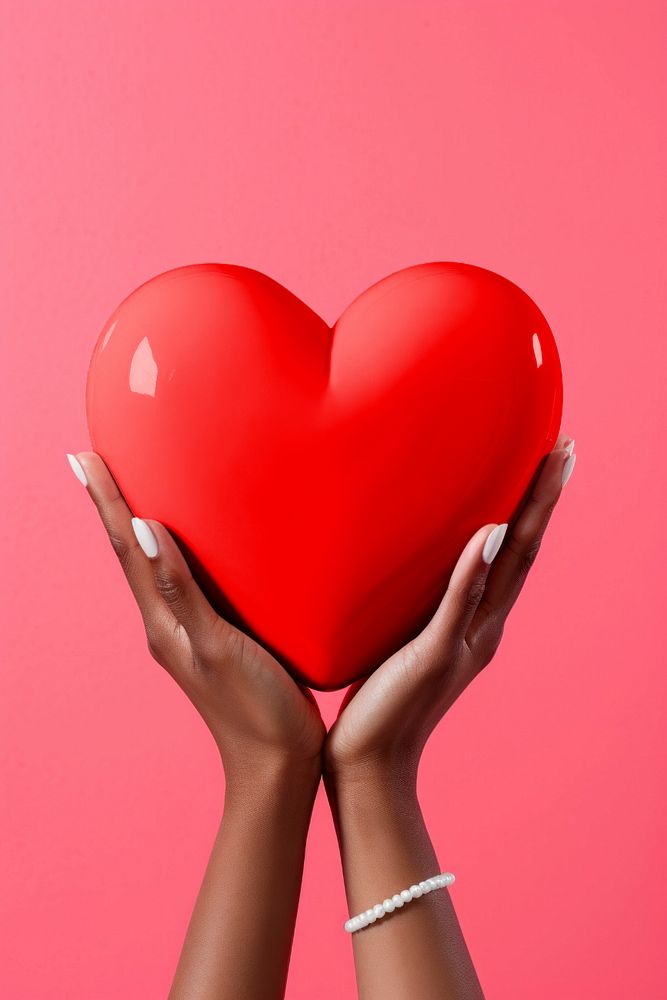 Heart mockup, editable held by hands design