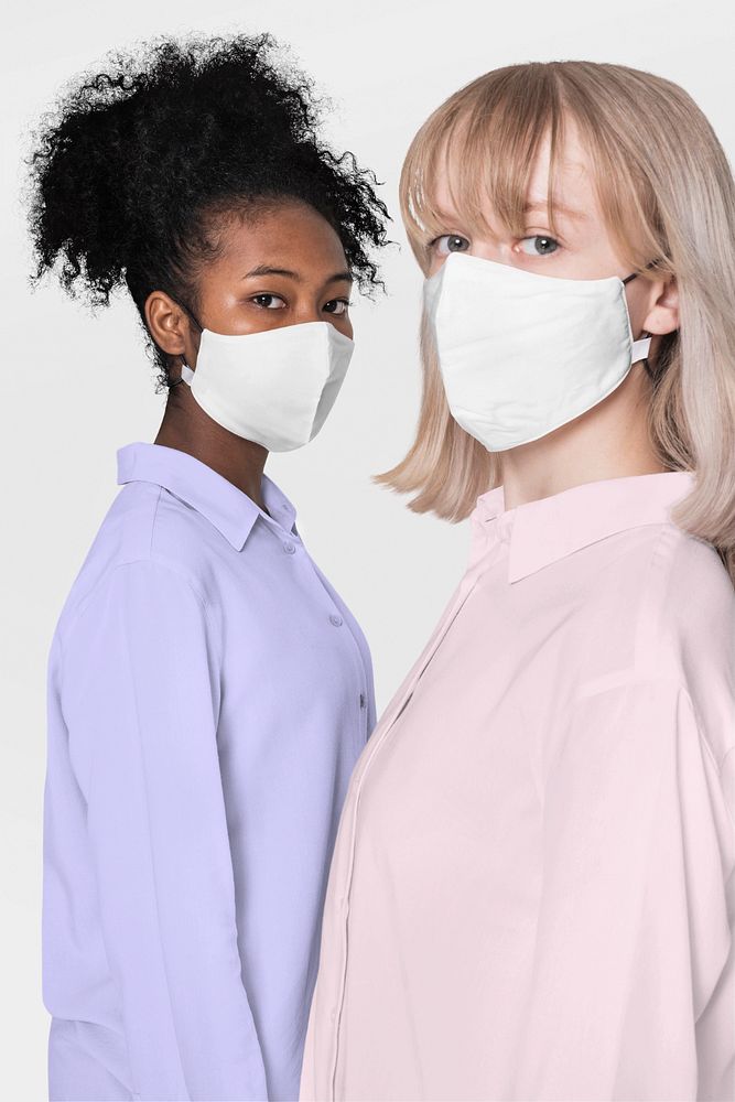 Women wearing white face masks