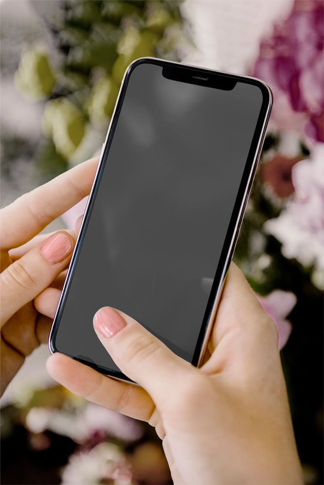 Phone screen mockup, woman hands, floral design 