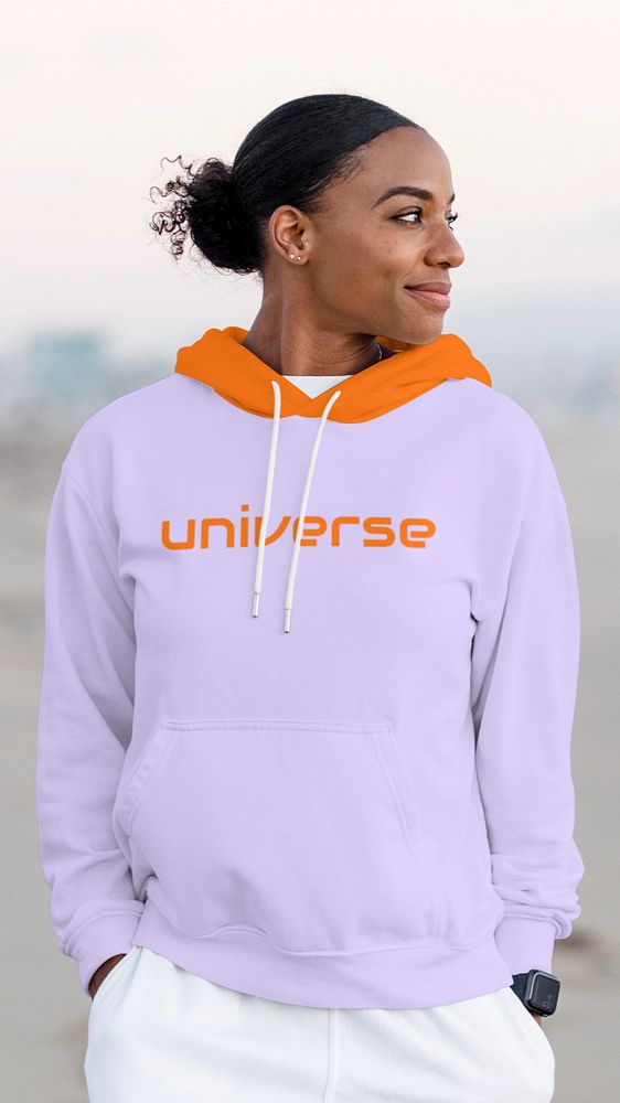 Hoodie mockup, woman walking at beach, editable design