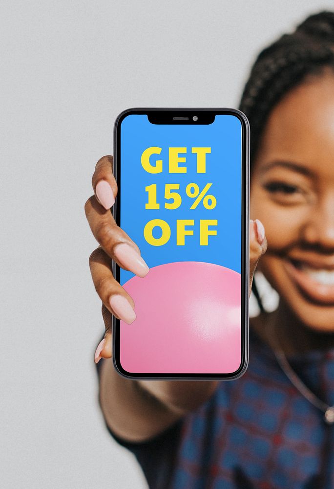 Editable mobile phone screen mockup, held by happy woman