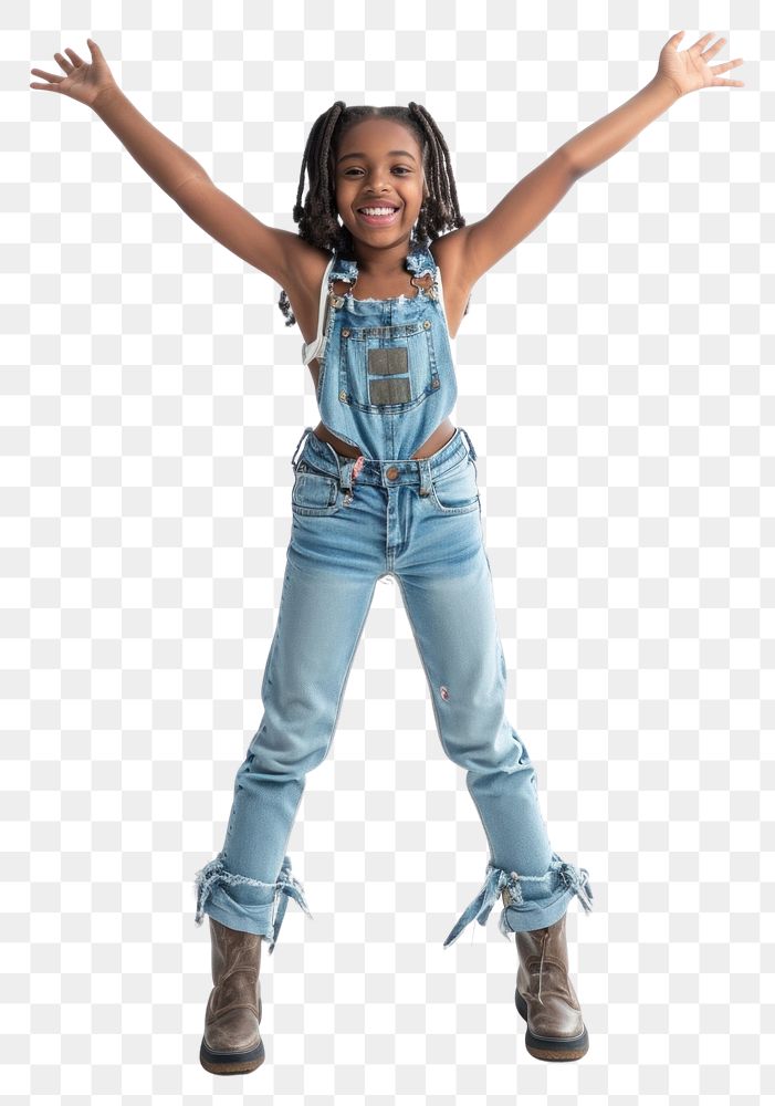 PNG A young girl stands with arms joyfully raised denim cheerful footwear.