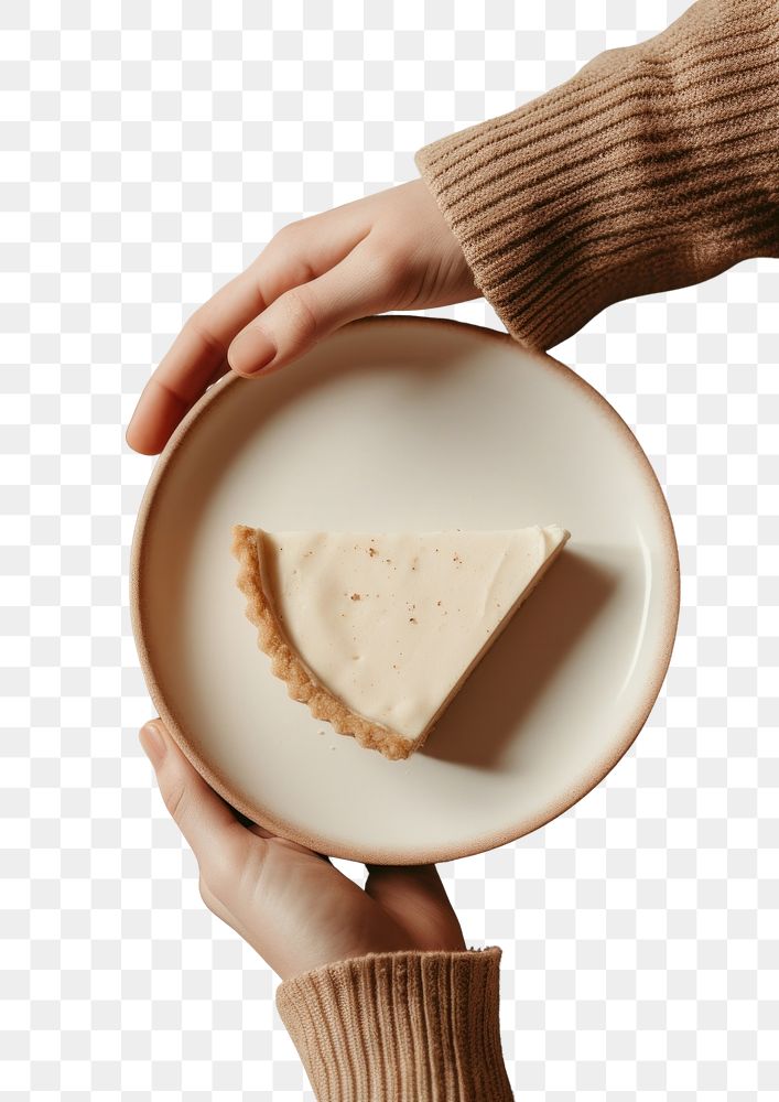 PNG A person holding piece of pie on plate cheesecake dessert food.