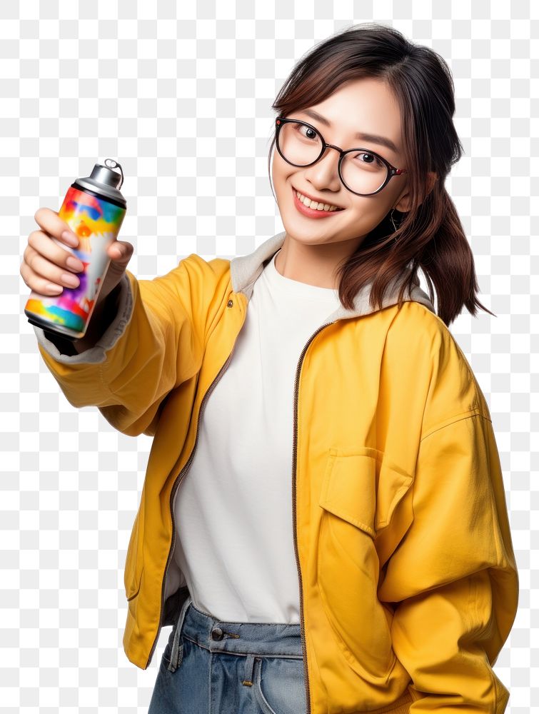 PNG A young woman holding a colour spray bottle and pointing to camera portrait smile photo. AI generated Image by rawpixel.