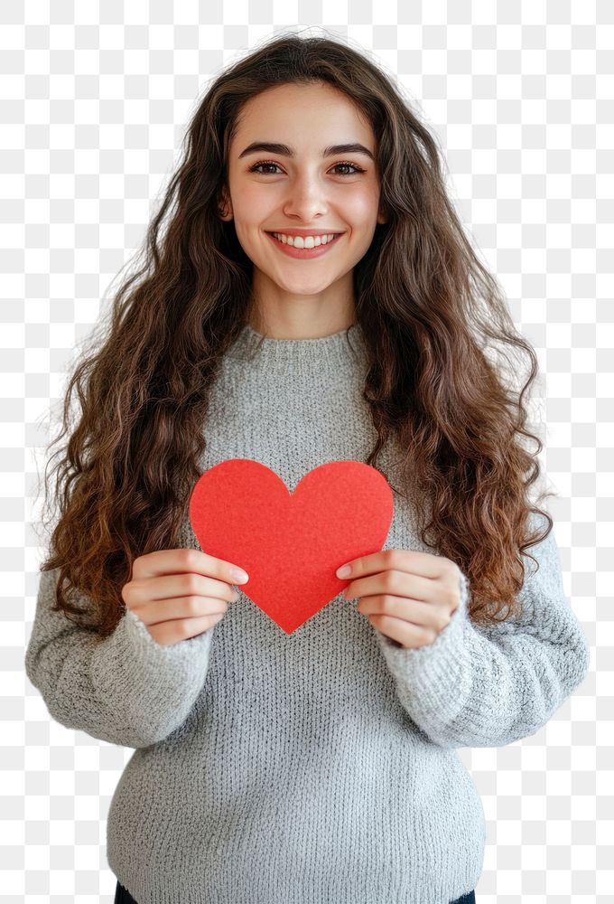 PNG Happy woman holding a heart paper shape sweater expression clothing.